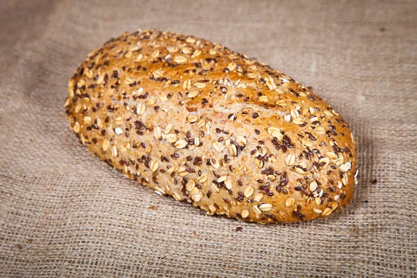 stock image Composition of fresh bread on wood