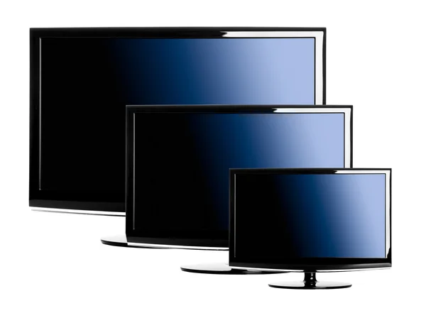 Три ЖК-телевизора — стоковое фото