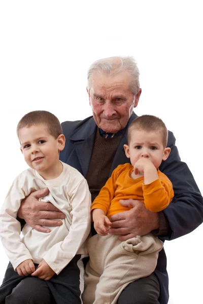 Дідусь з онуками — стокове фото