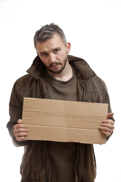 Mendigo sosteniendo el cartón —  Fotos de Stock