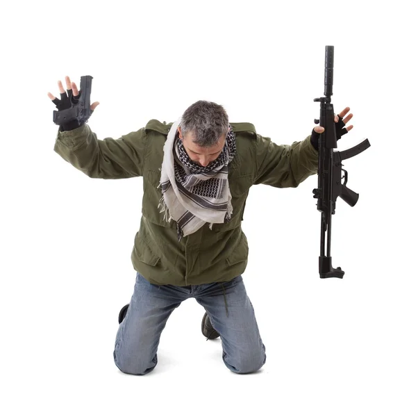 Terrorist met handen omhoog — Stockfoto