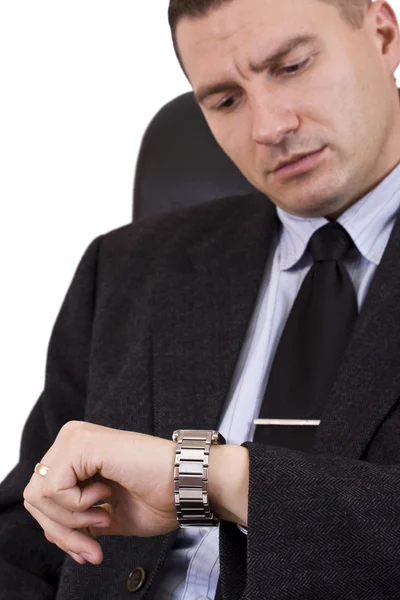 Podnikatel hledá hodinky — Stock fotografie