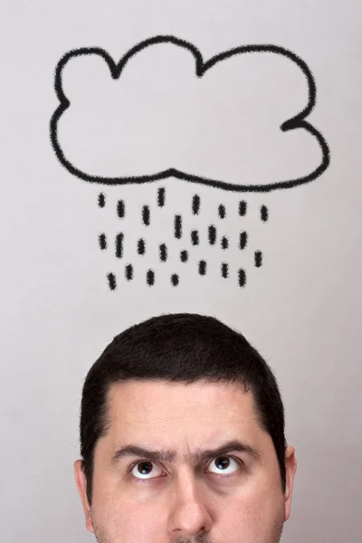 Мужчина с облаком дождя — стоковое фото