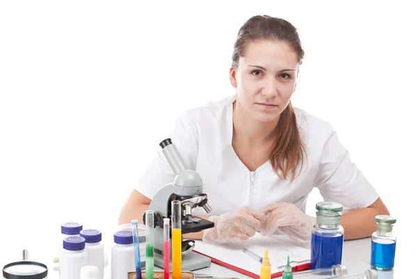 Scientist and microscope — Stock Photo, Image