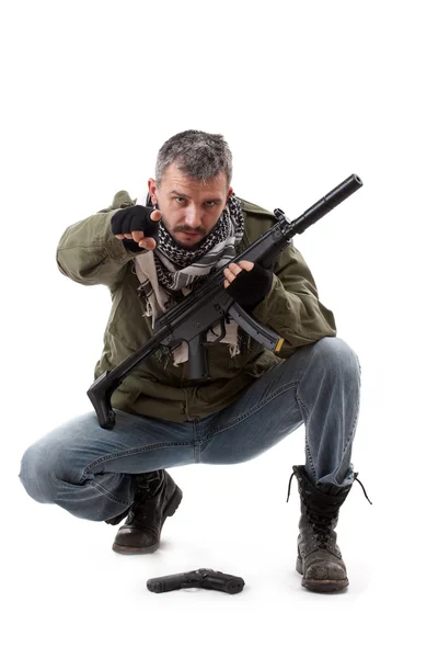 Terrorist with gun Stock Image