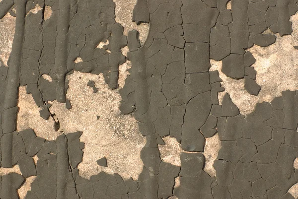 Стена с потрескавшейся штукатуркой — стоковое фото