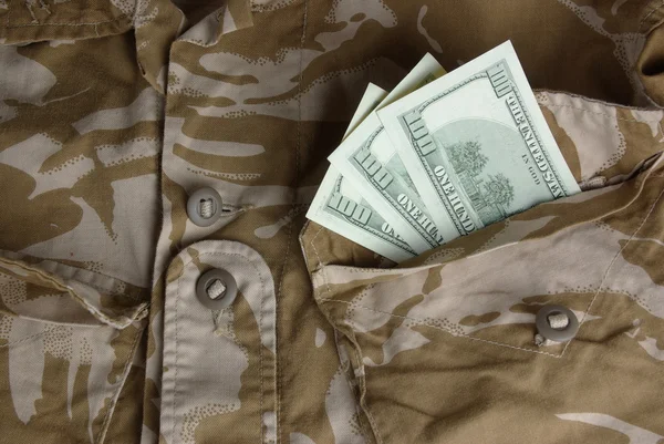 Dollars in an army jacket pocket — Stock Photo, Image
