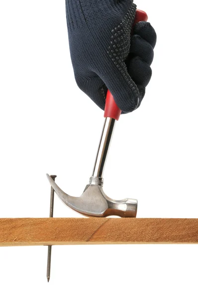 Carpenter pulls a nail. — Stock Photo, Image