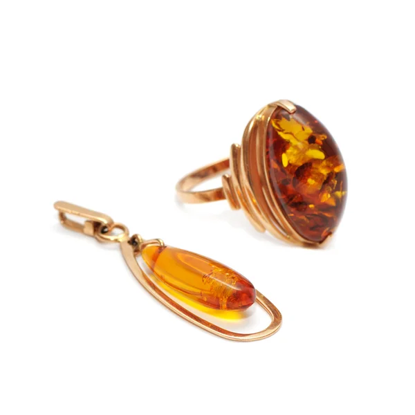 Gold ornaments with amber — Stock Photo, Image
