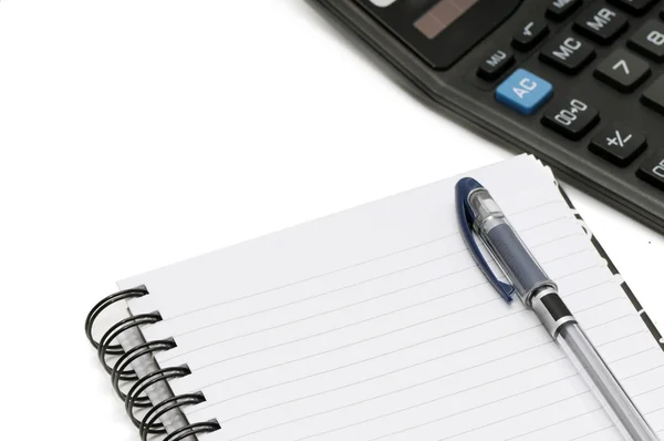 Notebook en rekenmachine — Stockfoto