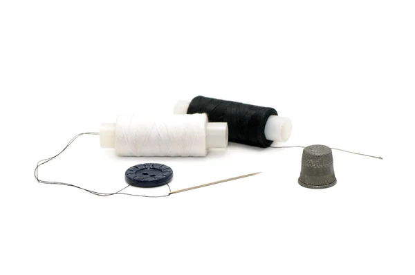 Thread with a needle and a thimble — Stock Photo, Image