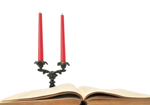 Buch und Kerzen — Stockfoto