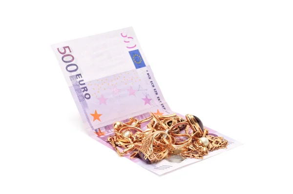 Zlaté ozdoby a euro — Stock fotografie