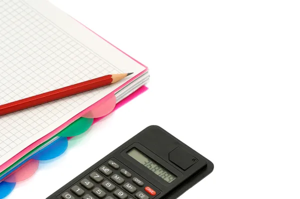 Cuaderno y calculadora — Foto de Stock