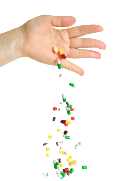 Spadające tabletki — Zdjęcie stockowe