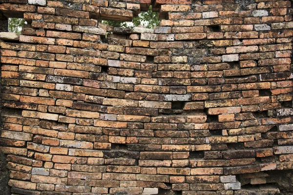 Sagging old brick wall background — Stock Photo, Image