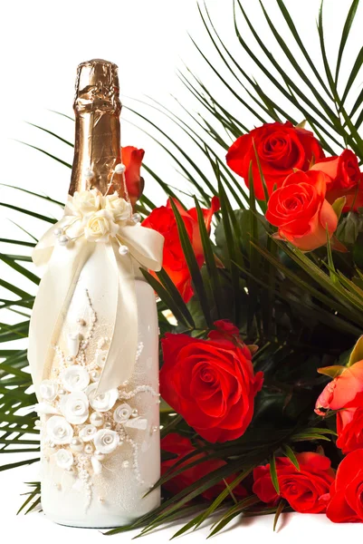 Rosor och champagne — Stockfoto