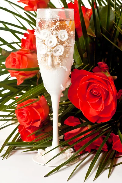 Glass of champagne with flowers — Stock Photo, Image