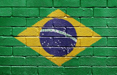 Flag of Brazil on brick wall clipart