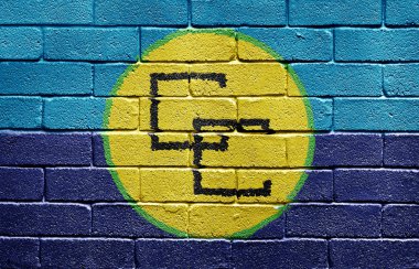 Flag of the Caribbean Community on brick wall clipart