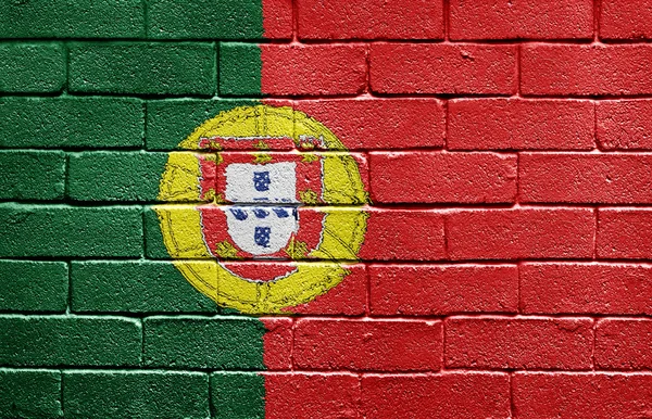 Tuğla duvarda Portekiz bayrağı — Stok fotoğraf