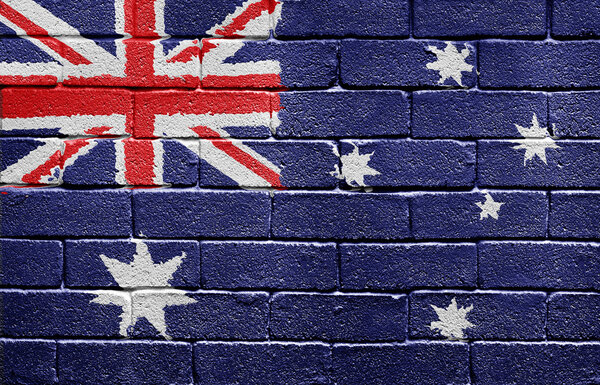 Flag of Australia on brick wall