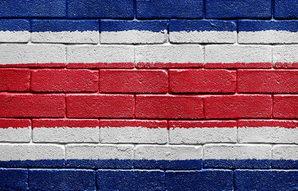 Σημαία της Κόστα Ρίκα στον τοίχο από τούβλα — Φωτογραφία Αρχείου