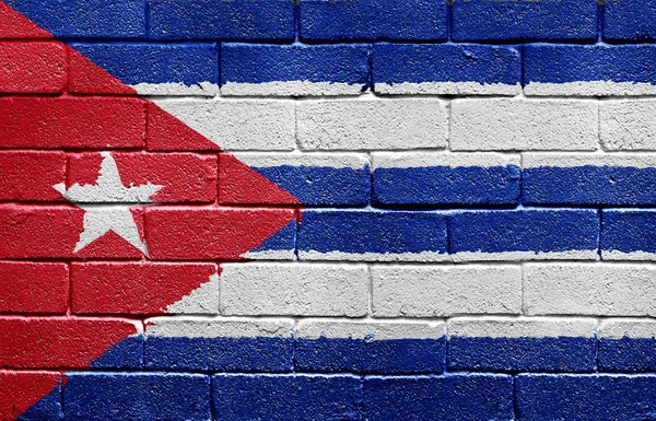 Bandiera di Cuba sul muro di mattoni — Foto Stock