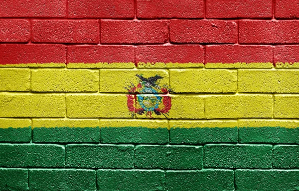 Bandera de Bolivia en la pared de ladrillo — Foto de Stock