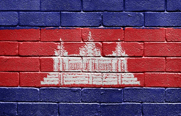 A téglafal Kambodzsa zászlaja — Stock Fotó