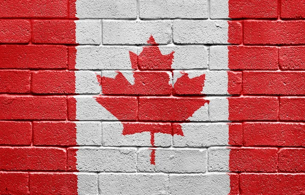 stock image Flag of Canada on brick wall