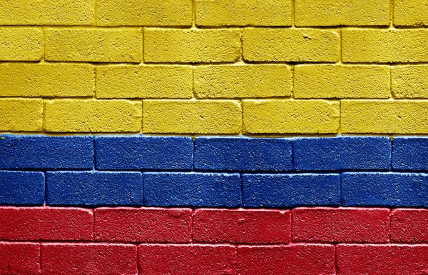 Σημαία της Κολομβίας στον τοίχο από τούβλα — Φωτογραφία Αρχείου