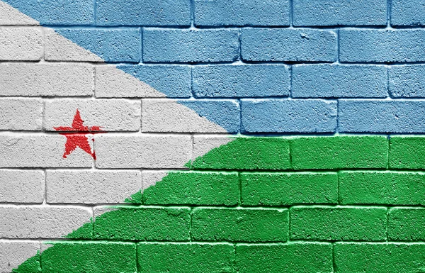 Bandeira de Djibouti na parede de tijolo — Fotografia de Stock