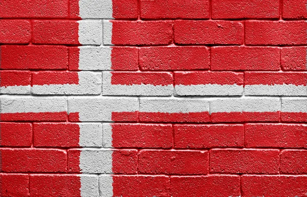Flagga Danmark på tegelvägg — Stockfoto