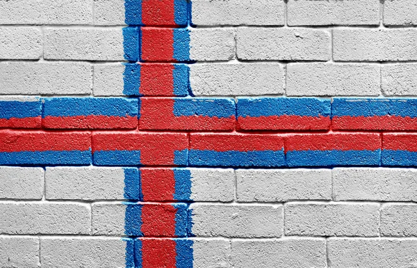 Bandeira das Ilhas Faroé na parede de tijolos — Fotografia de Stock