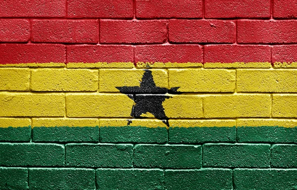 Flagge der Ghanas an Ziegelmauer — Stockfoto