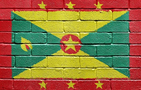 Flaga Grenady na mur z cegły — Zdjęcie stockowe
