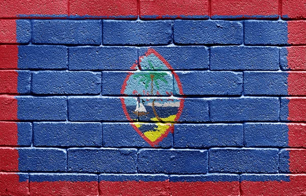 レンガの壁にグアムの旗 — ストック写真