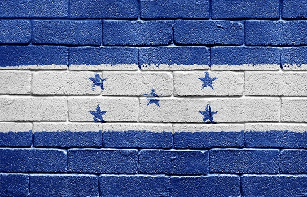 Bandera de Honduras en la pared de ladrillo —  Fotos de Stock