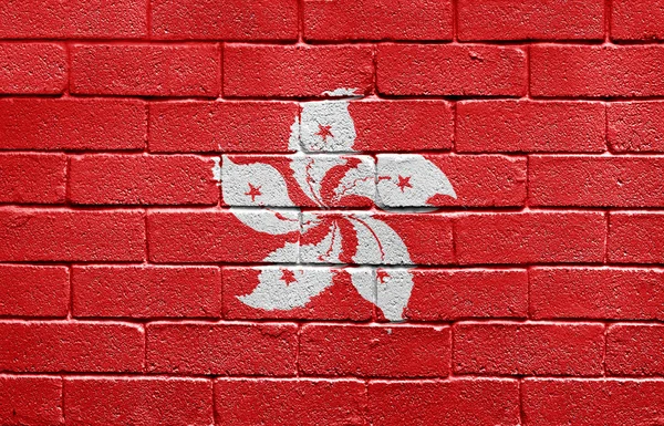 Flaggan av hong kong på tegelvägg — Stockfoto