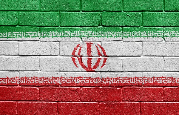 Bandiera dell'Iran sul muro di mattoni — Foto Stock