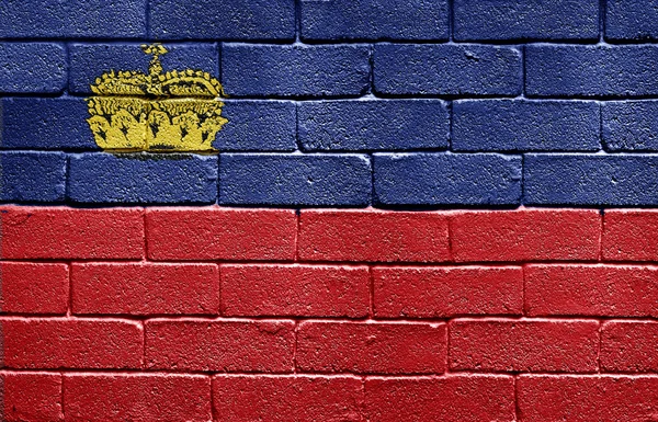 Bandiera del Liechtenstein sul muro di mattoni — Foto Stock