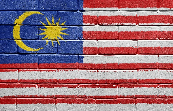 Σημαία της Μαλαισίας στον τοίχο από τούβλα — Φωτογραφία Αρχείου