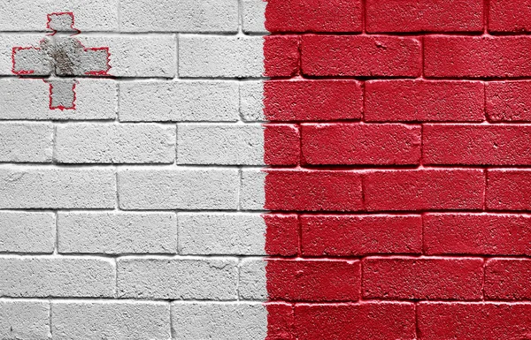 Прапор Мальти на цегляна стіна — стокове фото