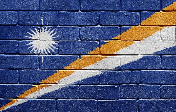 Flagga Marshallöarna på tegelvägg — Stockfoto