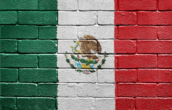 Флаг Мексики на кирпичной стене — стоковое фото