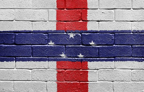 Bandera de las Antillas Holandesas en la pared de ladrillo — Foto de Stock