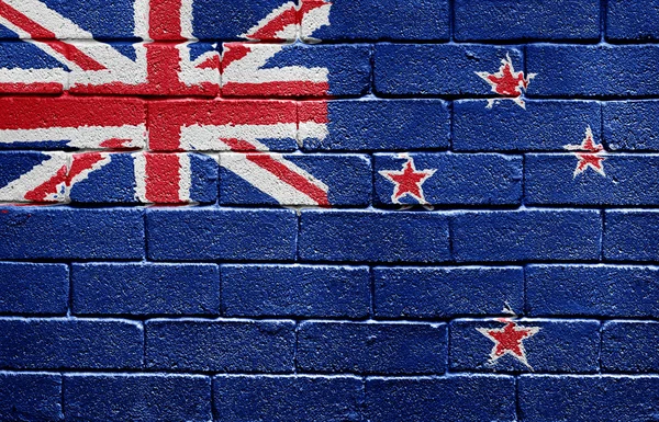 Tuğla duvarda Yeni Zelanda bayrağı — Stok fotoğraf