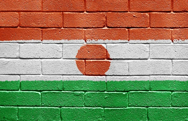 Flag of Niger on brick wall — Stock Photo, Image