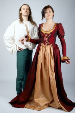 Beautiful pair of medieval costumes clipart